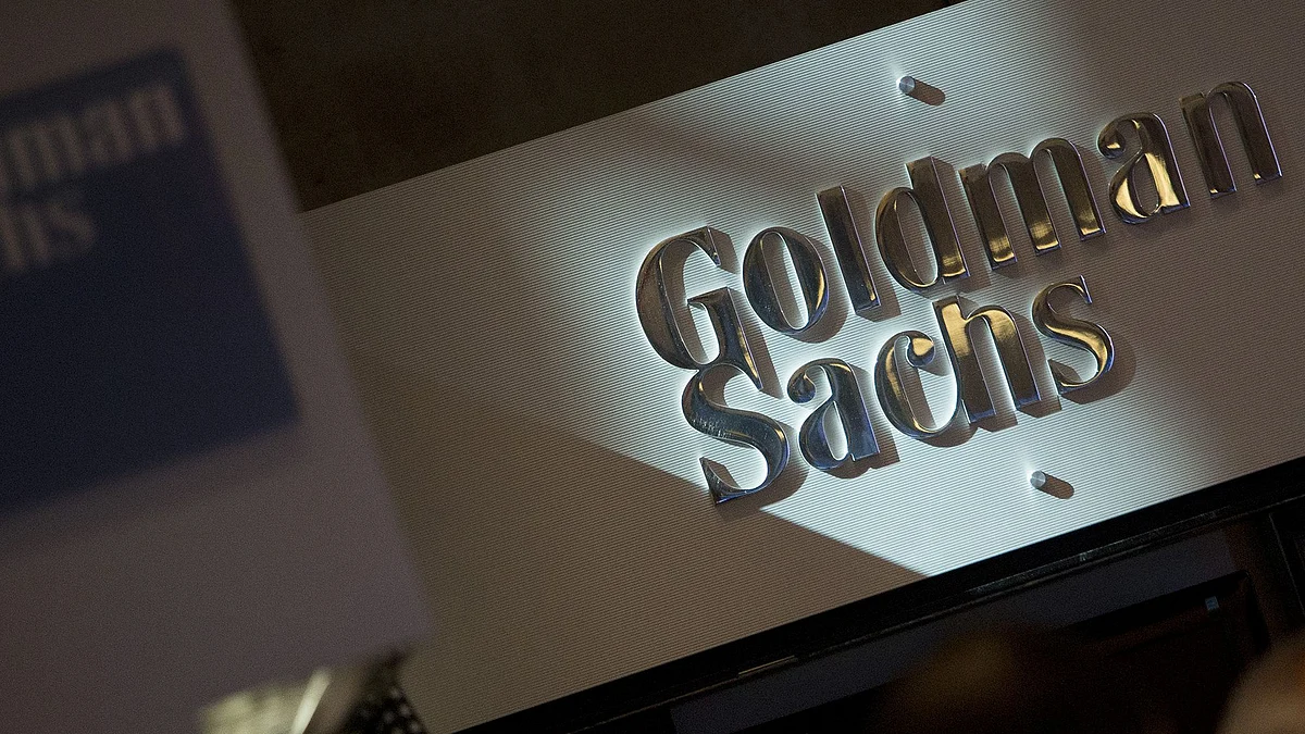 The Goldman Sachs & Co. logo is displayed at the company's booth on the floor of the New York Stock Exchange.