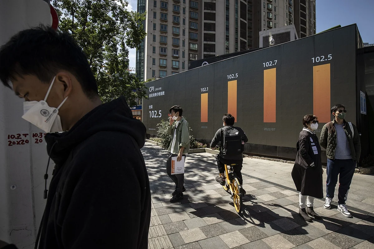 A public screen displays the consumer price index (CPI) figures in Shanghai, China, on Monday, Oct. 10, 2022. Chinese semiconductor stocks slumped after fresh US curbs on China’s access to American technology added to a disappointing start to the earnings season, stoking concerns that the industry’s downturn is far from over. Photographer: Qilai Shen/Bloomberg