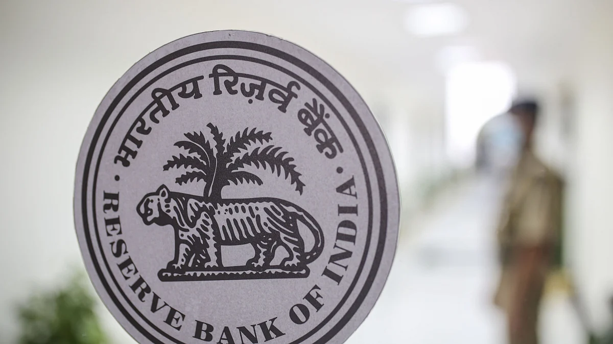 The Reserve Bank of India (RBI) logo displayed inside bank's headquarters in Mumbai, India, on Friday, Sep. 30, 2022. India’s central bank delivered a hat-trick of half-point interest-rate hikes, sustaining its battle to rein in inflation while flagging “calibrated action” to shield the economy amid fears of a global recession. Photographer: Dhiraj Singh/Bloomberg