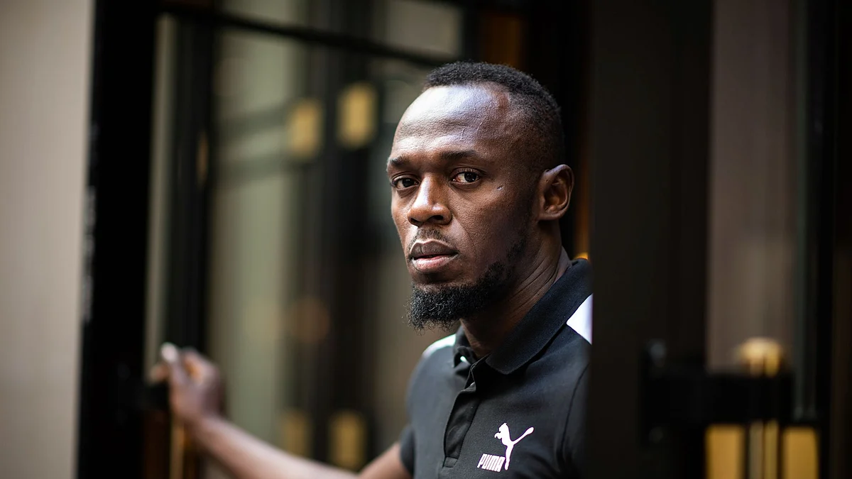 Jamaican Olympic sprinter Usain Bolt poses during a photo session as he launches a new brand of electric scooters named "Bolt" in Paris, on May 15, 2019. Photographer: Martin Bureau/AFP/Getty Images