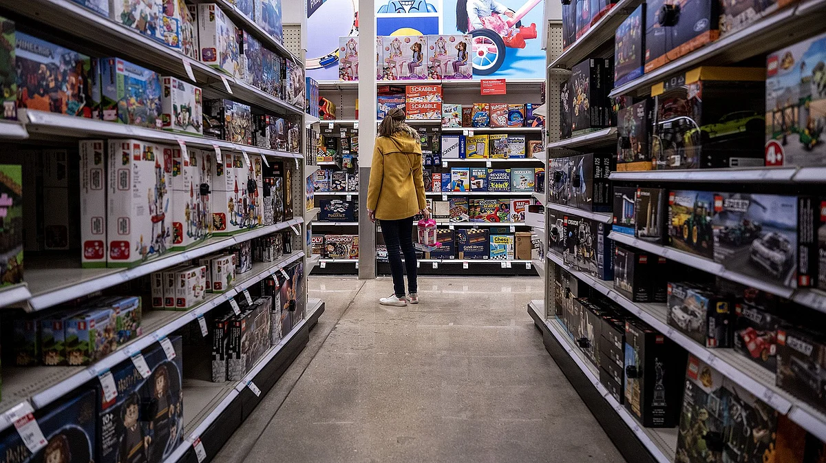 A shopper in the toy aisle of a store in Chicago. Photographer: Christopher Dilts/Bloomberg