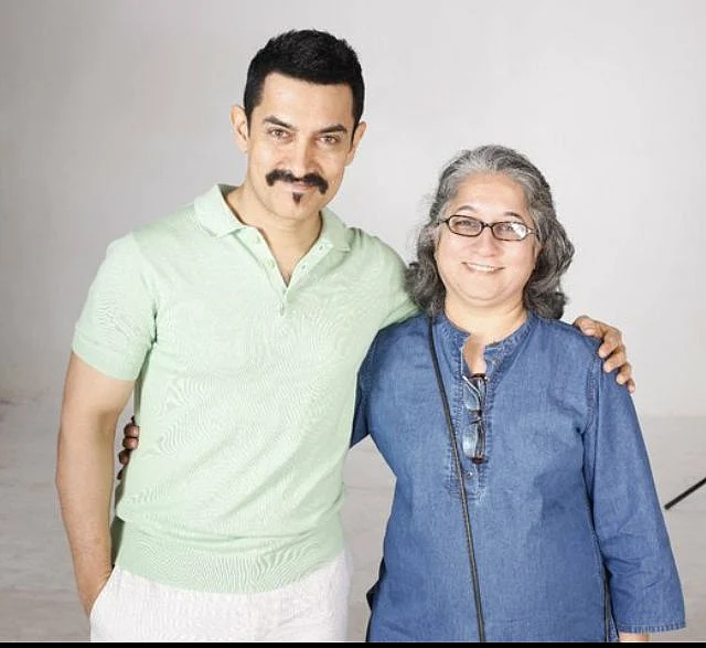 Kavita Thakur with Amir Khan on one of her myriad assignments