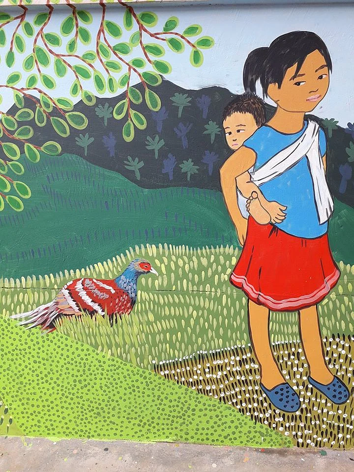 Manipur - state bird and girl carrying baby