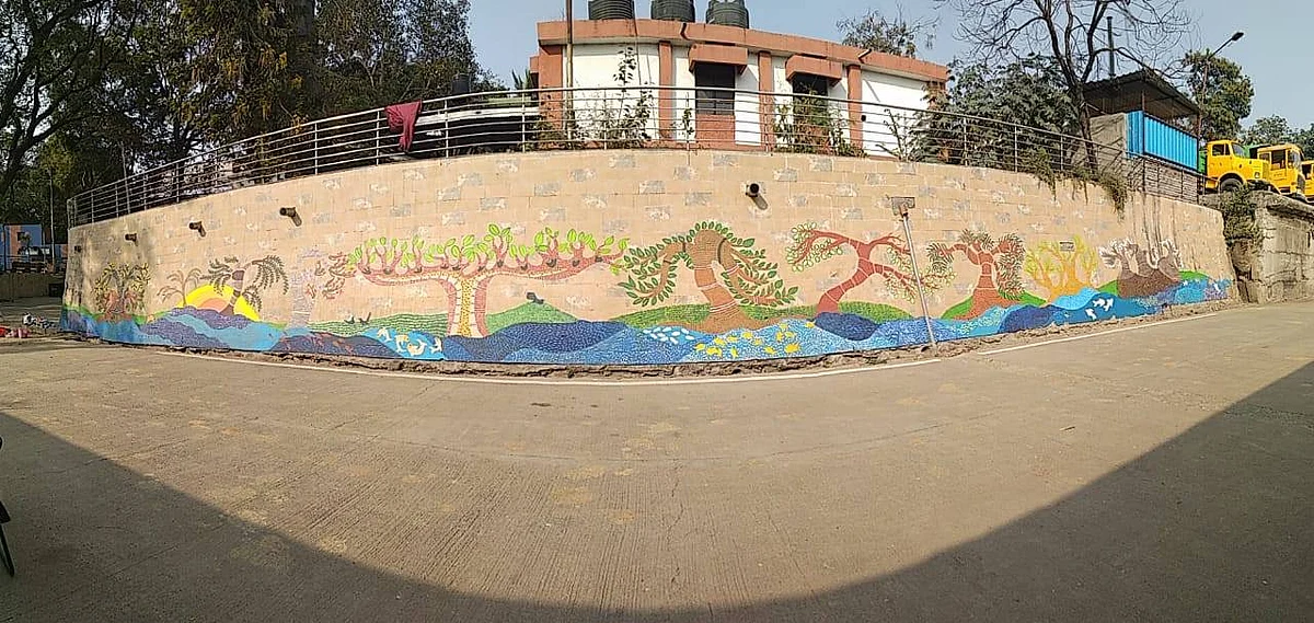 A fisheye view of the wall murial painting by the people led by Abha Bhagwat At the Dr Salim Ali Bird Sanctuary, Pune