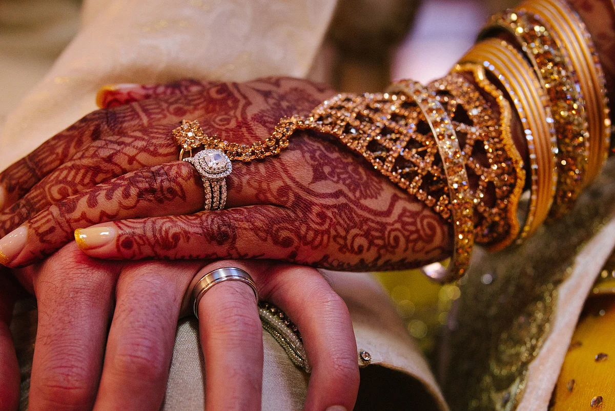 Bedecked hand of the bride