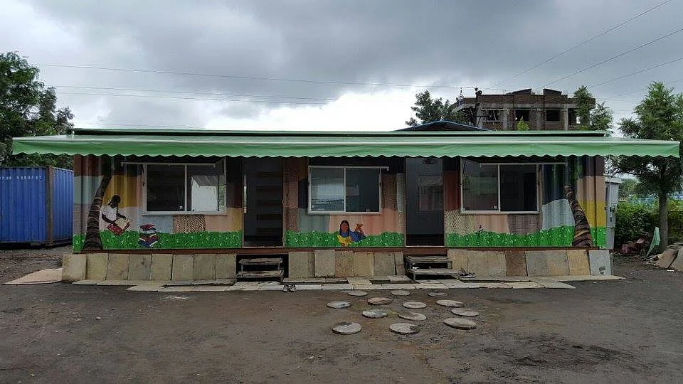 Painting on container school - tribal classroom and library