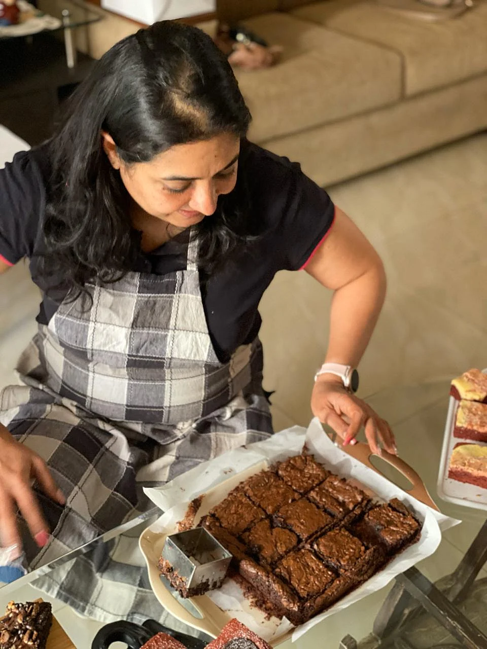 Aju has just baked a batch of chocolate brownies
