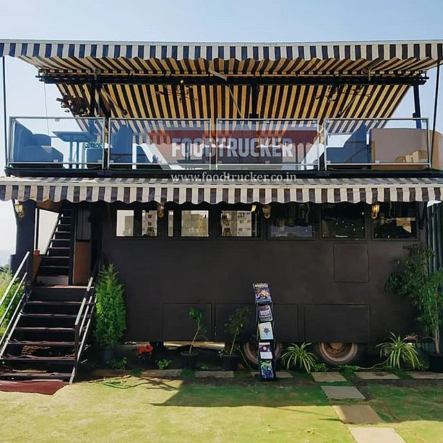 Foodtrucker Engineering LLP designed this elegant food truck with extra space for dining in
