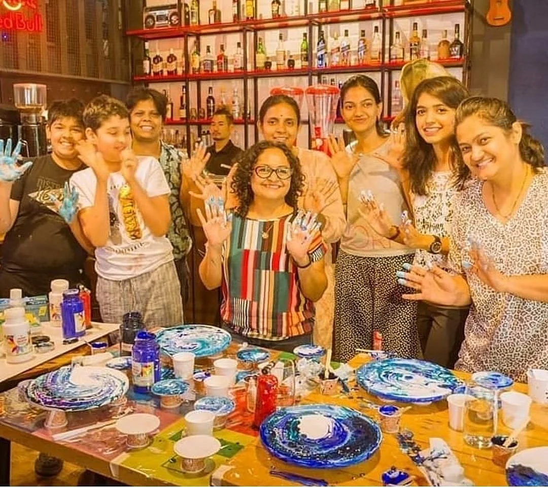 Hemal with enthusiastic participants at an art party