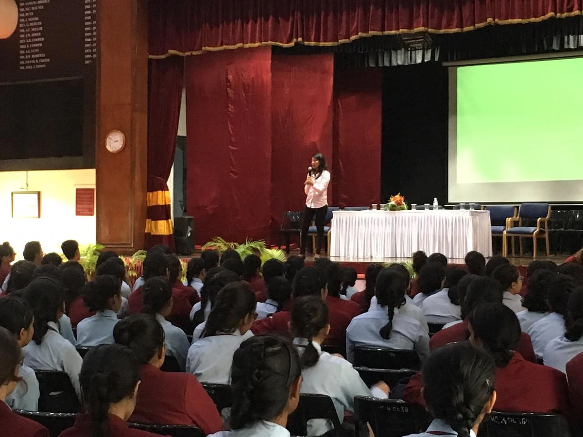 Liyaan conducting a counselling session at a school