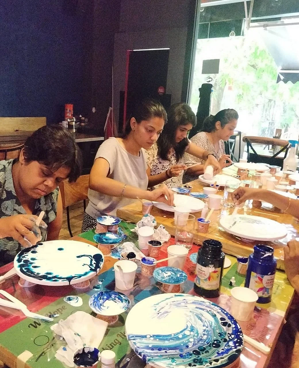 Thoroughly engrossed in an art class