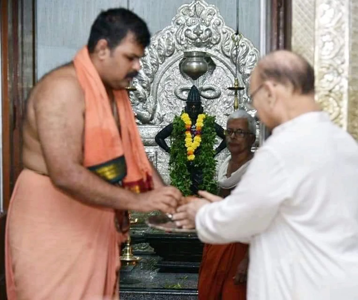 Former Chief Minister Pratap Singh Rane and Purohit Ramapati Pitre on the occasion of Shri Vitthal Pujan in Vitthalapur-Goa, 20 July, 2021.