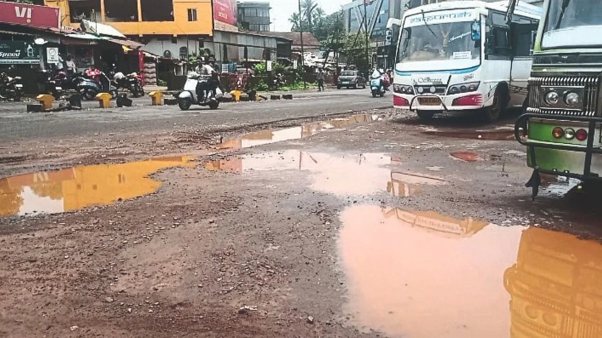 Mud at an alternative bus station in Bicholim due to rain