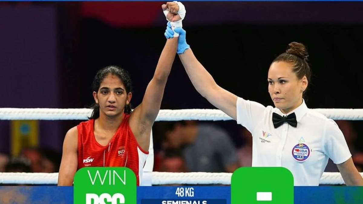 India's boxer Nitu Ghangas advances to the finals of 48 kg category in Women's Boxing