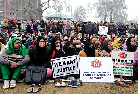National Health Mission workers of Jammu and Kashmir stage protest at Srinagar, demanding regularisation of jobs (Abid Bhat)