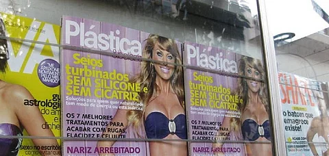 A plastic surgery-themed magazine is displayed in a Brazil storefront. hollywoodsmile310, CC BY-NC-ND