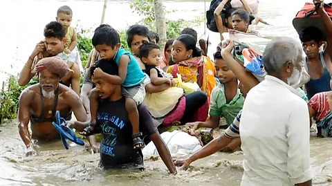 Escaping the Dhansiri floods in Assam. Credit: Rubul Ahmed