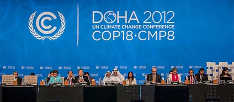 Doha outcome adopted. US reserves its right to walk out later 