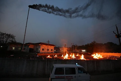 Bodies of COVID-19 patients being cremated recently at the Bhadbhada crematorium in Bhopal. Photo: Gagan Nair