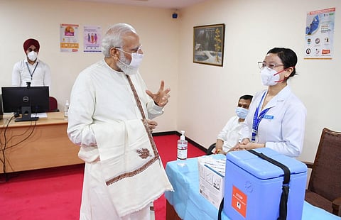 Prime Minister Narendra Modi at a vaccination centre at Dr Ram Manohar Lohia Hospital. Photo: @narendramodi / Twitter