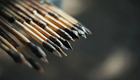 To test the ballistic properties of the stone points found in the Mandrin cave, modern duplicates were created and hafted on to shafts, as they may have been 54,000 years ago. Photo: Laure Metz, Ludovic Slimak, CC BY-SA