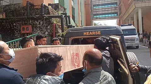 A coffin bearing the body of one of the Nepal victims of the disaster. Photo: Dichen Ongmu