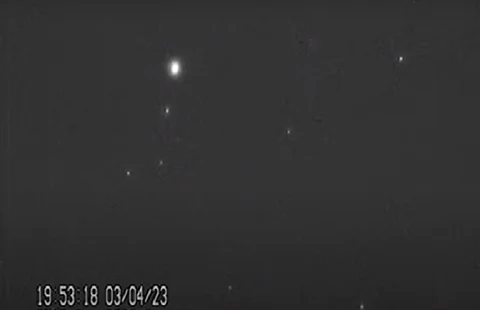 Three satellites are visible in this screengrab from video shared by Nature via Marco Langbroek, Delft Technical University. The brightest spot is BlueWalker 3