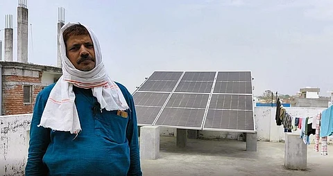 Ravish Kumar Chaudhary, who installed a 3 kW solar plant under the PM Suryaghar Yojana in Aloknagar Colony, Varanasi. Photo: Varsha Singh