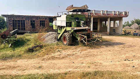 The house in Patiala’s Rohar Jagir village that sparked the landmark 2011 Supreme Court judgement to protect India’s commons. Owner Jagpal Singh now uses it to park his harvester and store farm implements. Despite the ruling, the sarpanch says the 80 houses encroaching upon the village pond were never demolished due to fears of backlash