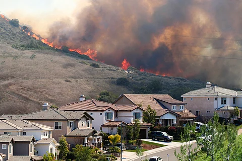 How America courted increasingly destructive wildfires — and what that means for protecting homes today
