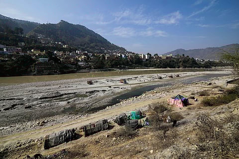 Echoes of erosion: Sand, stone and sacred waters