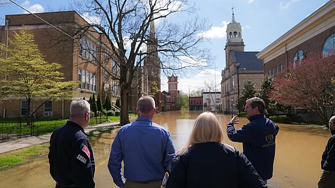 Kentucky Governor Andy Beshear at a flooded site. 