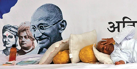 Activist Anna Hazare sits on a fast during the anti-corruption movement of 2011  