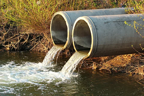 Discharge of sewage into a river
