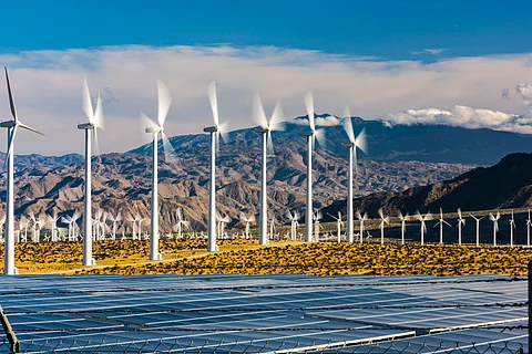 A wind farm with solar panels in southern California.