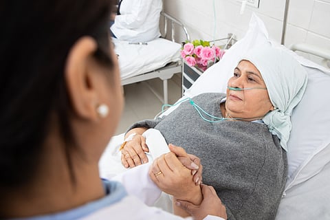 Why do women face a higher cancer incidence in India but lower mortality than men?