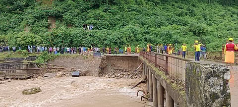Rescue workers at Devbhoomi College in Premnagar after reports of students stranded in the floods.