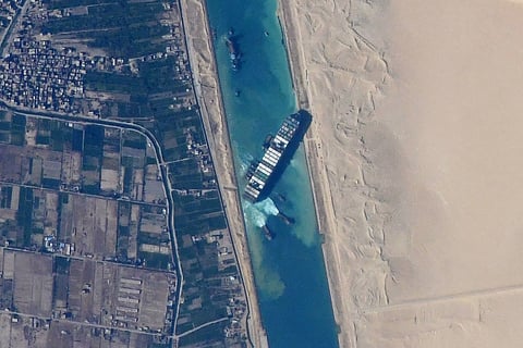 The container ship Ever Given stuck in the Suez Canal in Egypt, viewed from the International Space Station