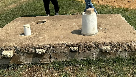 A leaking septic tank observed at a household.