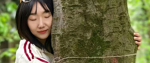 Why so many young people in China are hugging trees