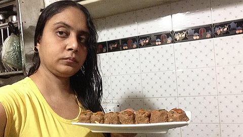 The author with urad dal ki pinnis/