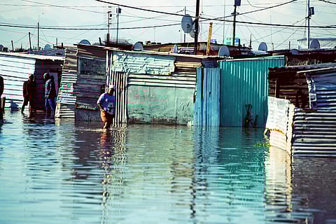 The shack homes of residents in Langa township, near Cape Town, South Africa, were flooded during days of heavy rainfall in June 2022.