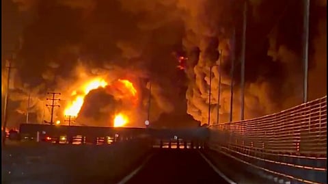 A massive fire at the Aqdasiyeh Oil Depot in Northern Tehran on March 8, 2026 following a strike, with the entire facility seen engulfed in flames.