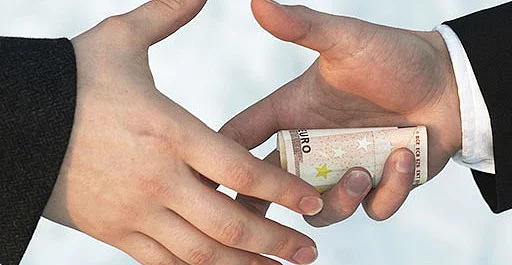 Assistant Registrar caught taking bribe