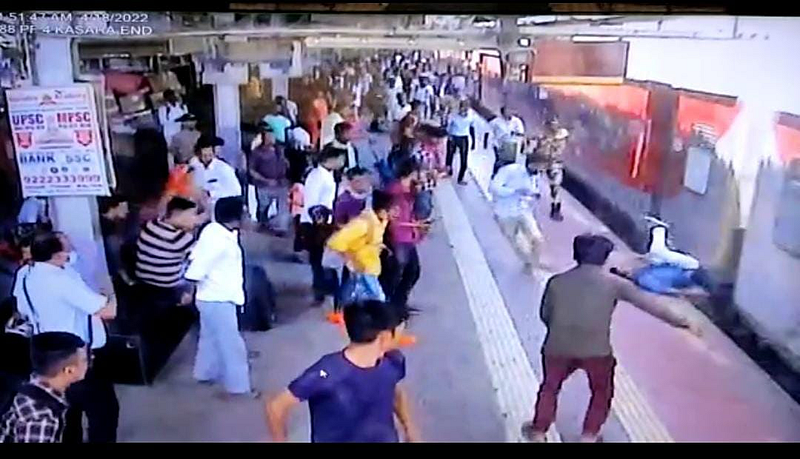young man fell while catching the railway express RPF police save lives mumbai