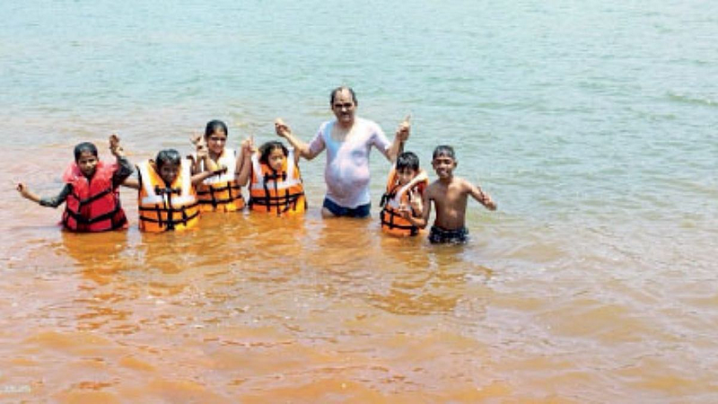 Swimming lessons for students from headmaster Deepak Bhujbal Kelghar