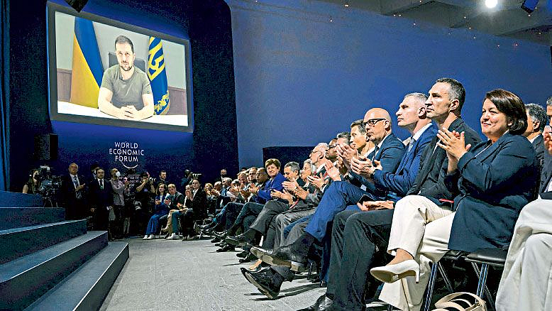 Russia invading Ukraine Volodymyr Zelenskyy World Economic Forum restriction on russia