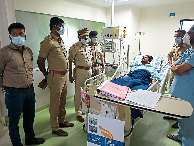 Police with saved patient