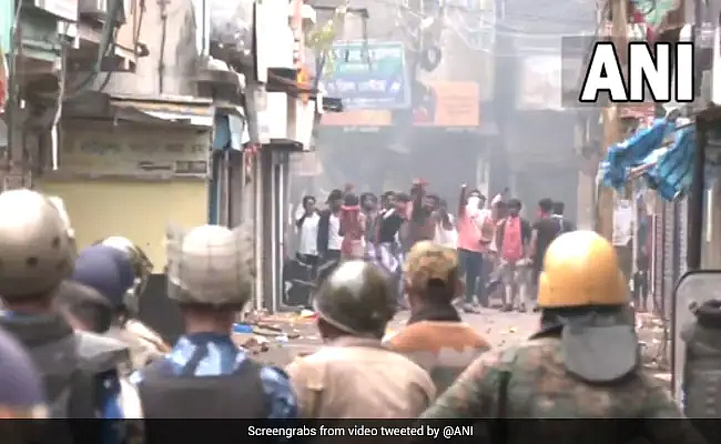 Prophet controversy: Protesters hurled stones and police used tear gas canisters