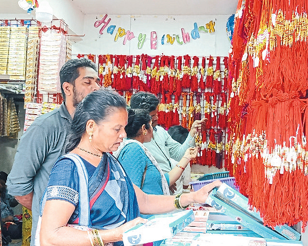 Women buying rakhi.